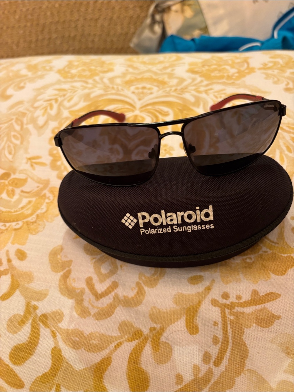 Polaroid Men's Black Frame Sunglasses with Dark Lenses